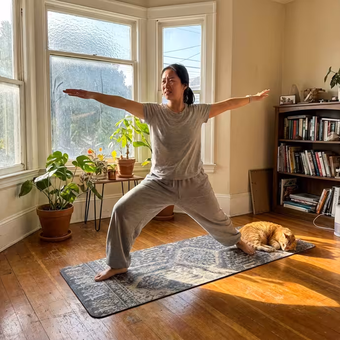 Morning yoga practice by the bay window